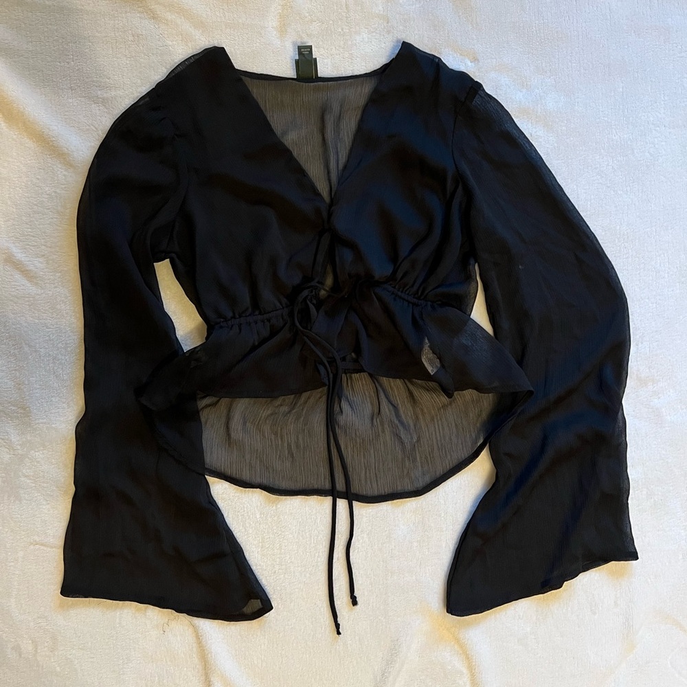 Target crop, mesh backing with adjustable tie string.